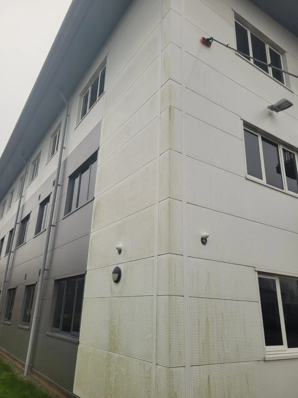 Multi-storey commercial exterior cleaning in progress