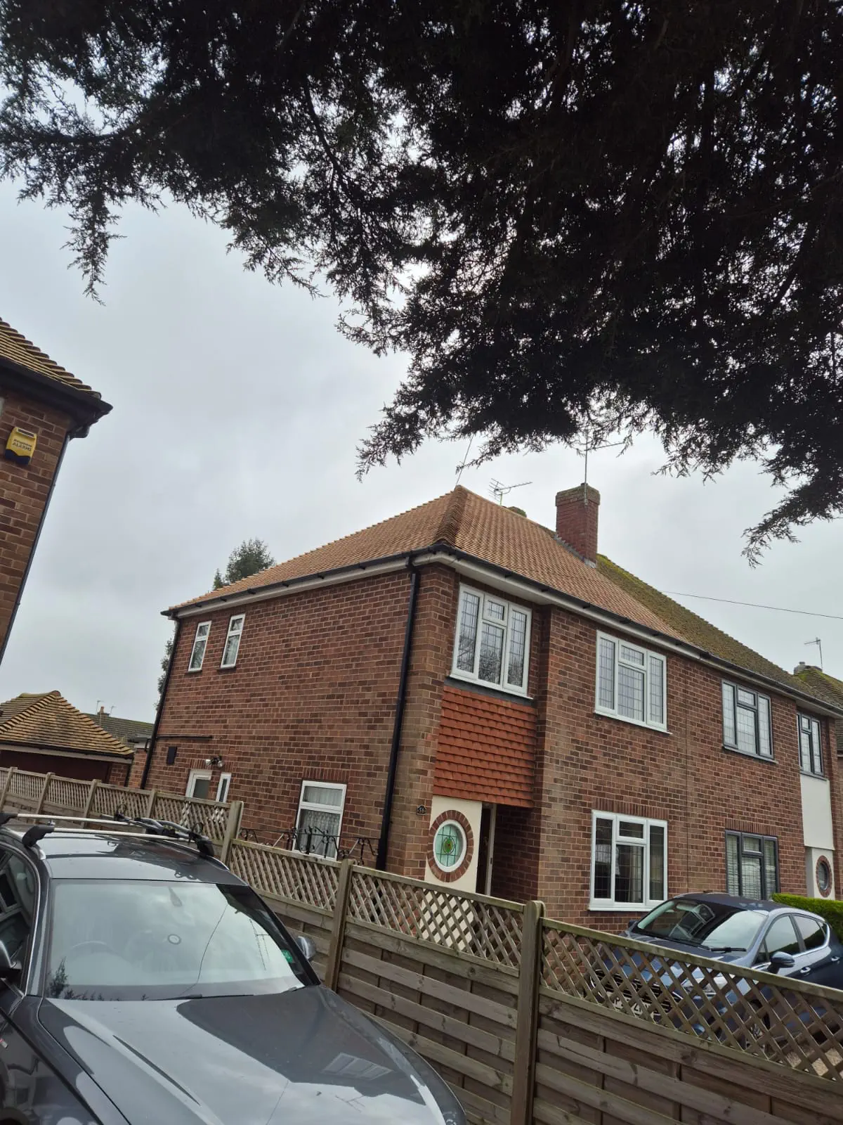 Residential window cleaning project at a brick home