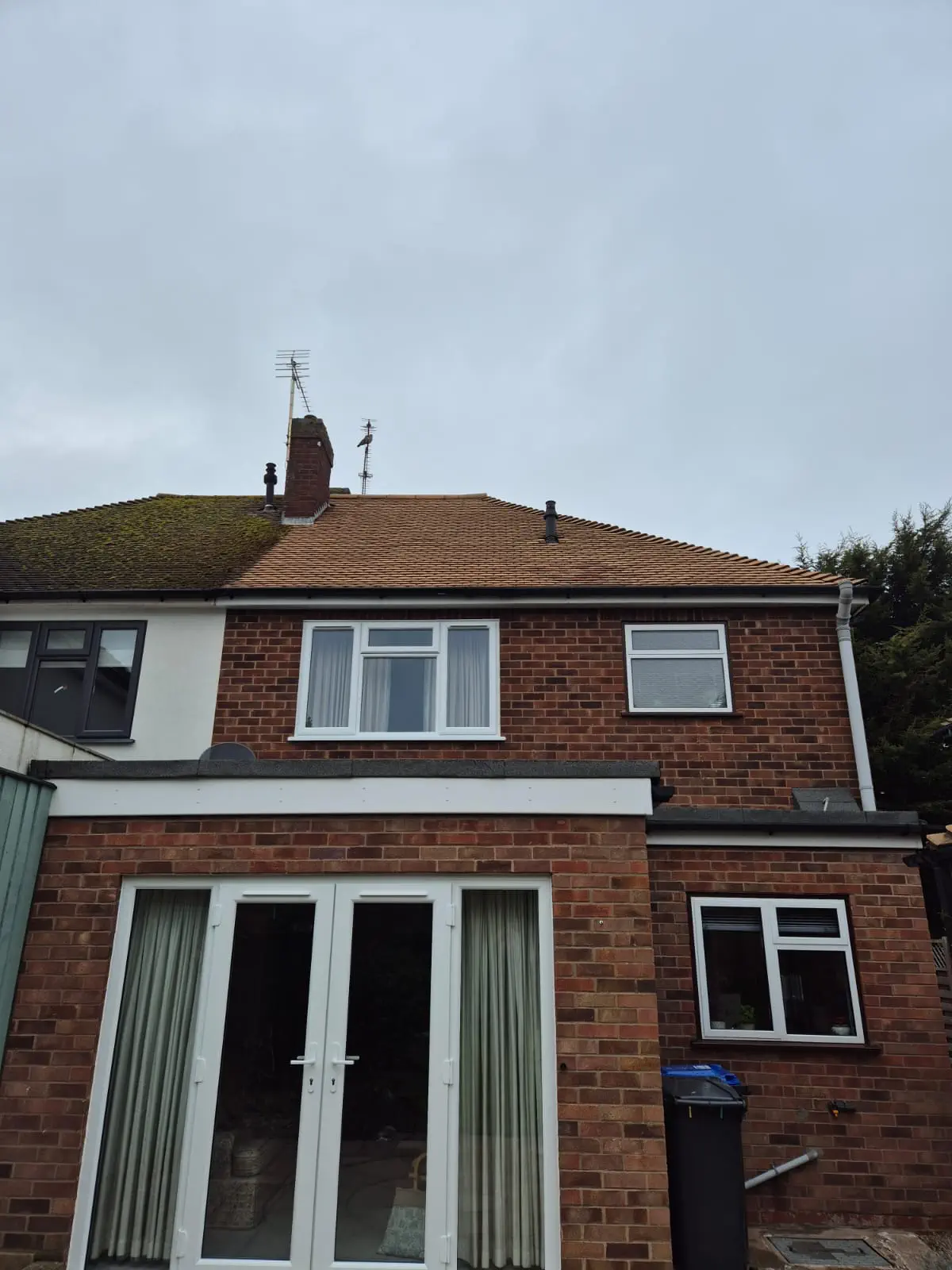 Rear extension and upper windows of a residential home